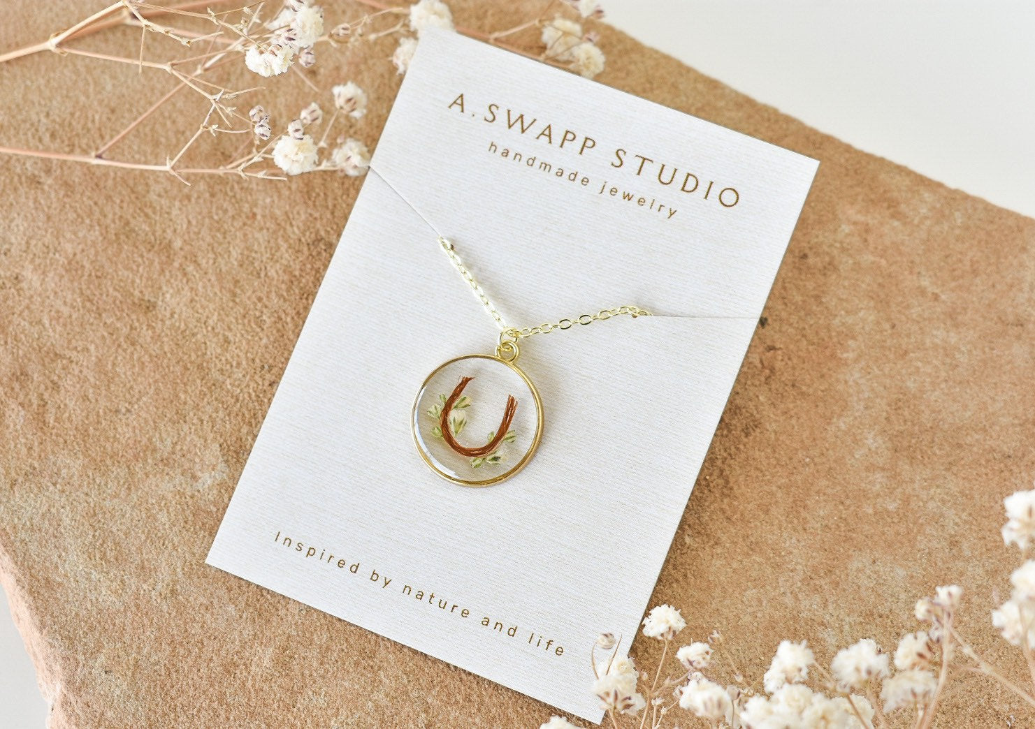 custom handmade horse hair keepsake necklace, made with resin and horse mane or tail hair preservation