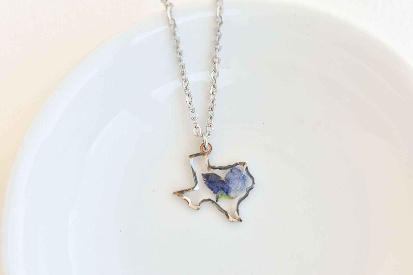 Texas shaped necklaces with state flower, bluebonnets, handmade gift in resin