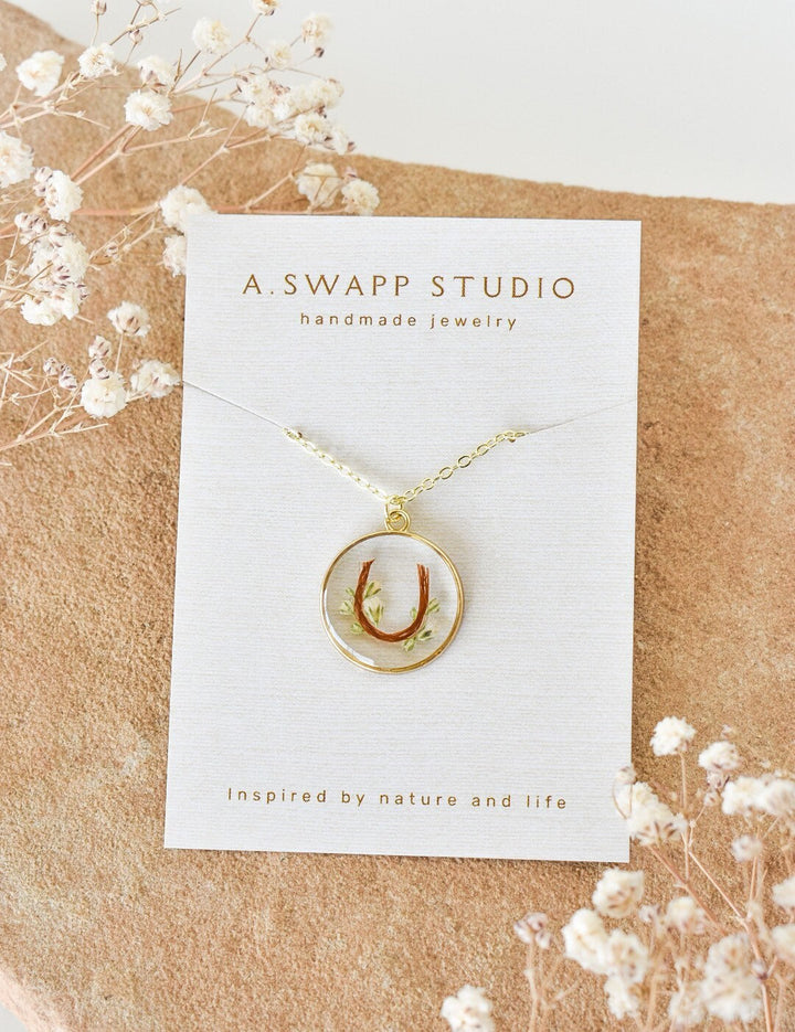 custom handmade horse hair keepsake necklace, made with resin and horse mane or tail hair preservation