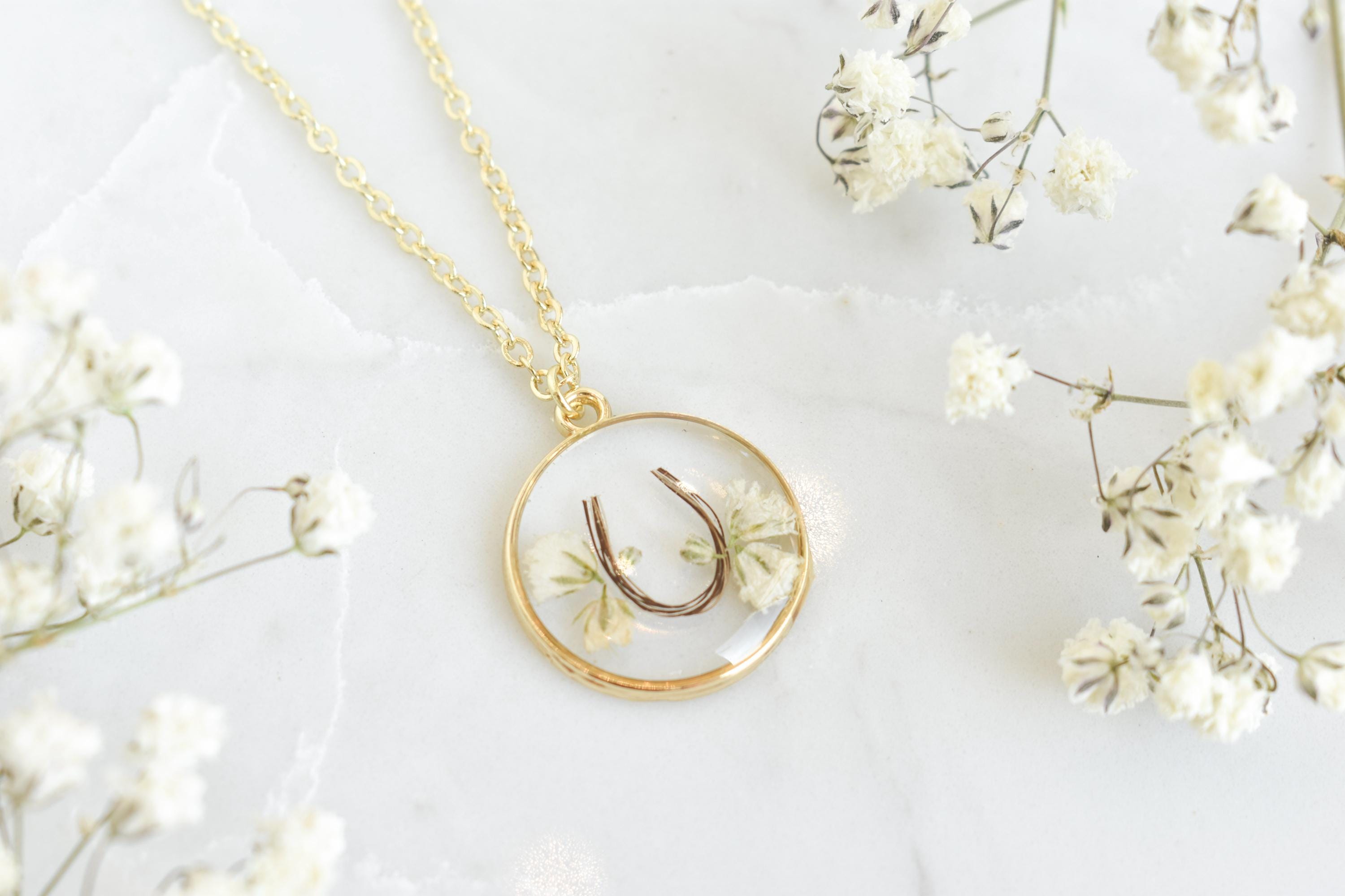 custom handmade horse hair keepsake necklace, made with resin and horse mane or tail hair preservation