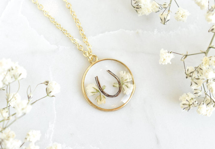custom handmade horse hair keepsake necklace, made with resin and horse mane or tail hair preservation