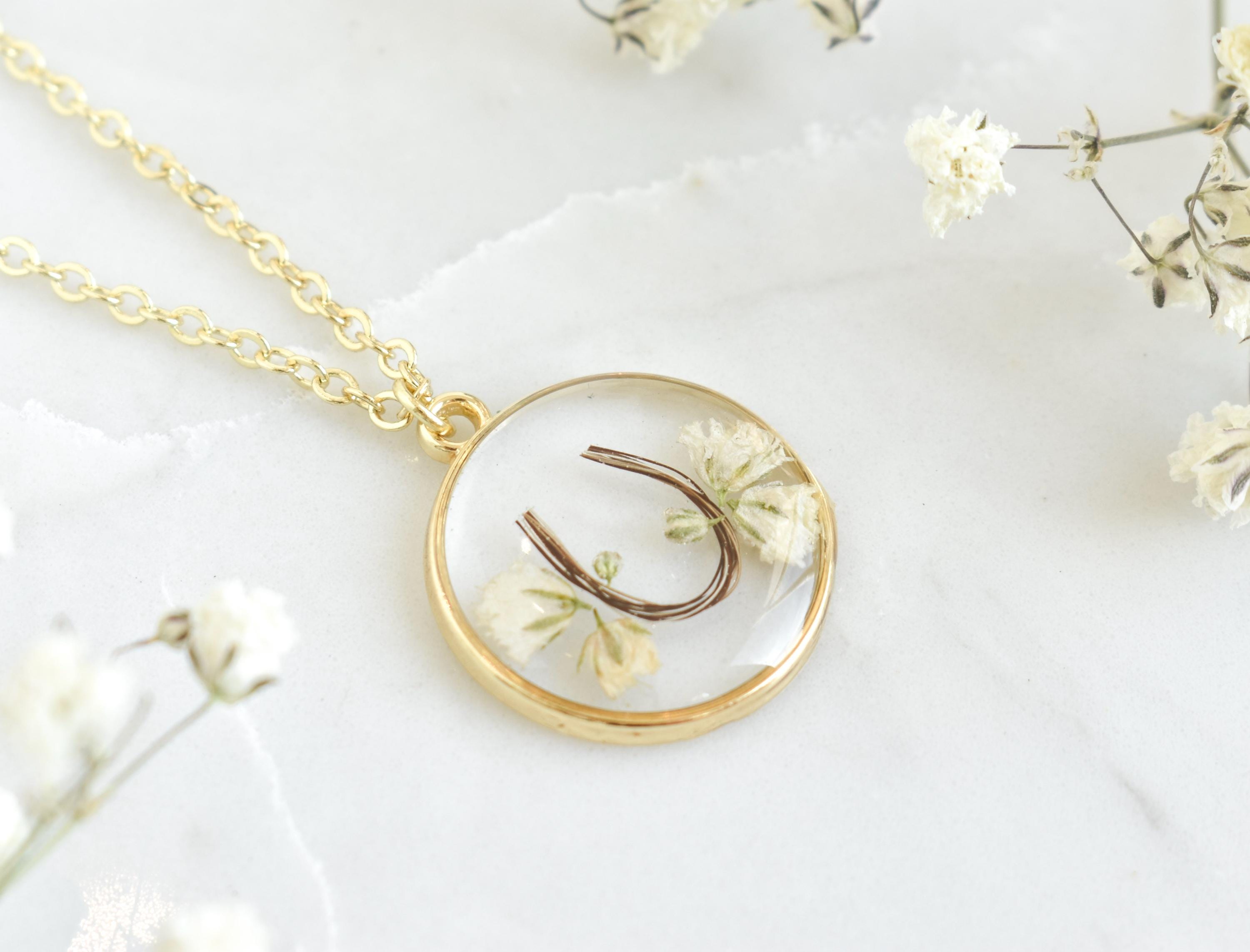 custom handmade horse hair keepsake necklace, made with resin and horse mane or tail hair preservation