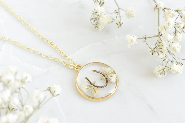 custom handmade horse hair keepsake necklace, made with resin and horse mane or tail hair preservation