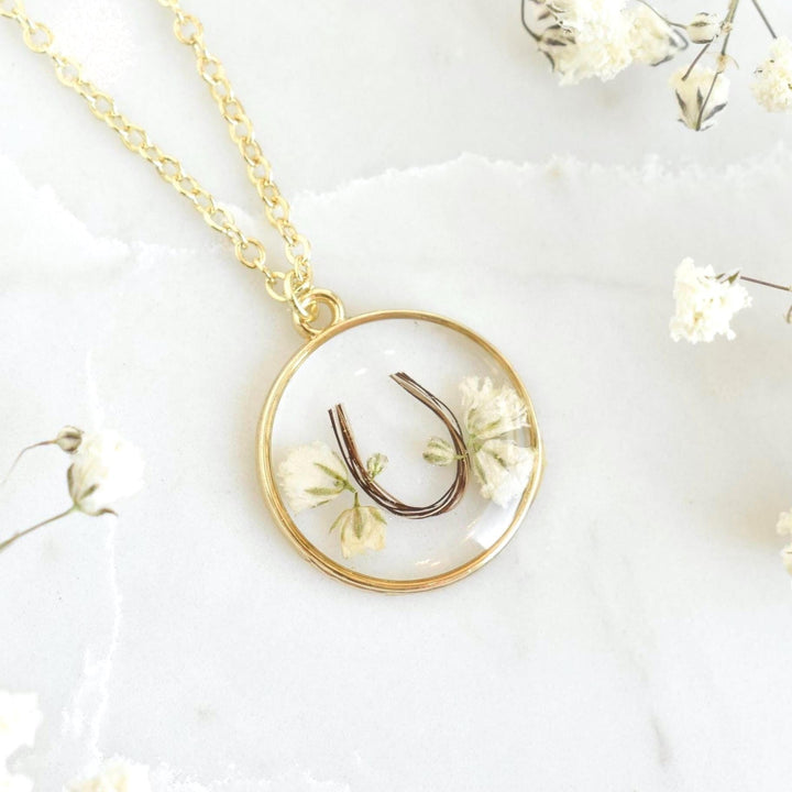 custom handmade horse hair keepsake necklace, made with resin and horse mane or tail hair preservation